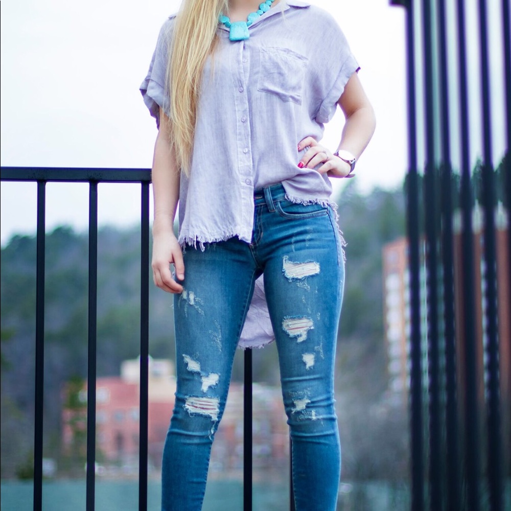 distressed high low button down w folded sleeves